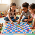 White girl braids white tee holding orange dice raised fist Black curly-haired boy grey pointing excitedly mixed-heritage girl pink gasping delight colourful foam play mat Snakes Ladders board green pawn wooden blocks teddy bears sunlit