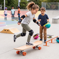 Girl confidently riding Kids Starter Skateboard at colourful skate park with full protective gear while friend cheers