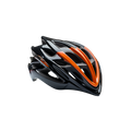 Boy wearing black and green cycling helmet while riding bike in park