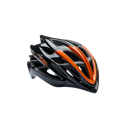 Boy wearing black and green cycling helmet while riding bike in park