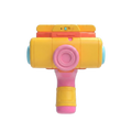 Kids Multi-Lens Science Camera Projector Toy front face view showing yellow body orange-red top rail pink central lens turquoise side ports and power toggle switch