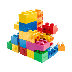 Jumbo Rainbow Interlocking Brick Construction Set multi-colour large-stud bricks stacked in abstract tower yellow blue green red pink orange peach deep stud tops hollow undersides